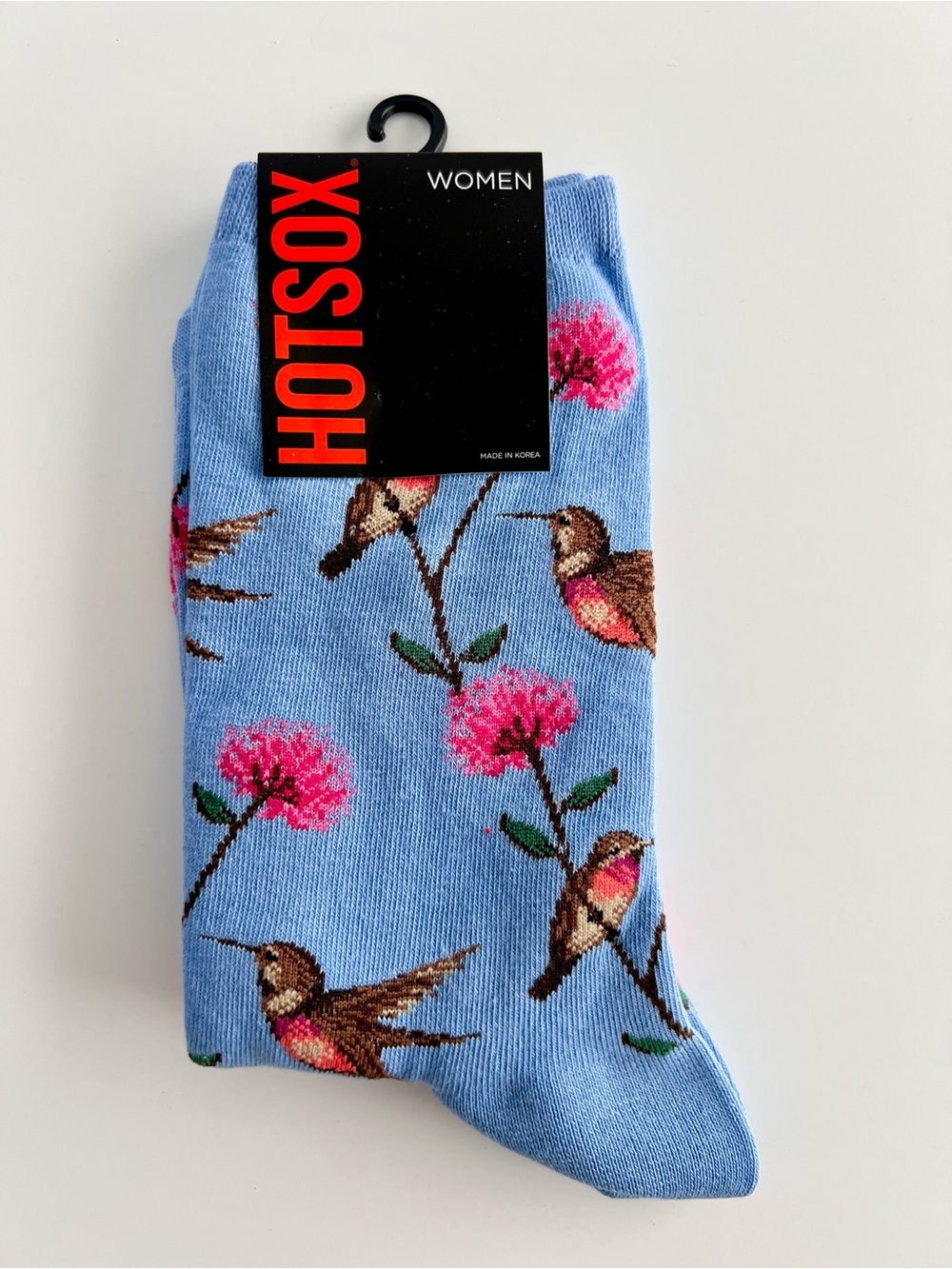 Hot Sox Women's Light Blue Crew Socks with Pink Floral & Hummingbird Motif